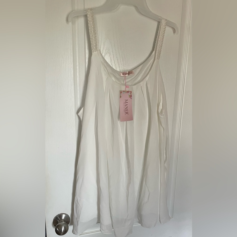 Beautiful sheer blouse/ camisole with beading detail.